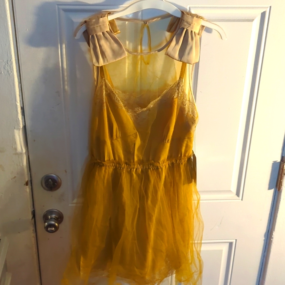 Satin dress with tulle overlay and satin bows